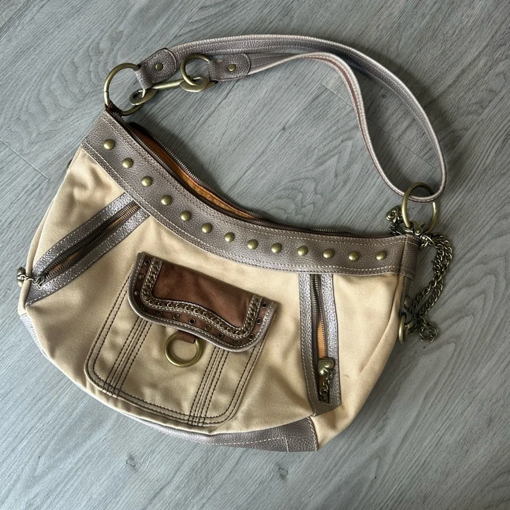 Kathy Van Zeeland brown and tan studded canvas + leather shoulder bag
